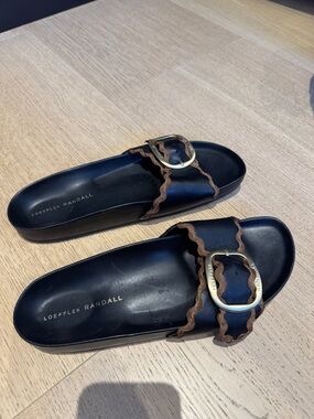 Loeffler Randall Black Leather Slide Sandals with Brown Scalloped Trim